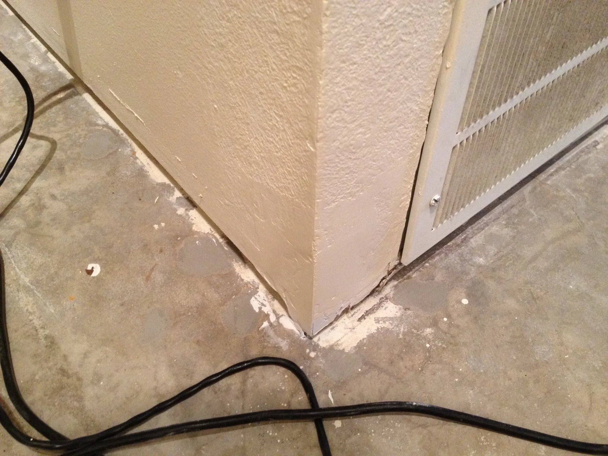 Finished drywall repair on a wall corner