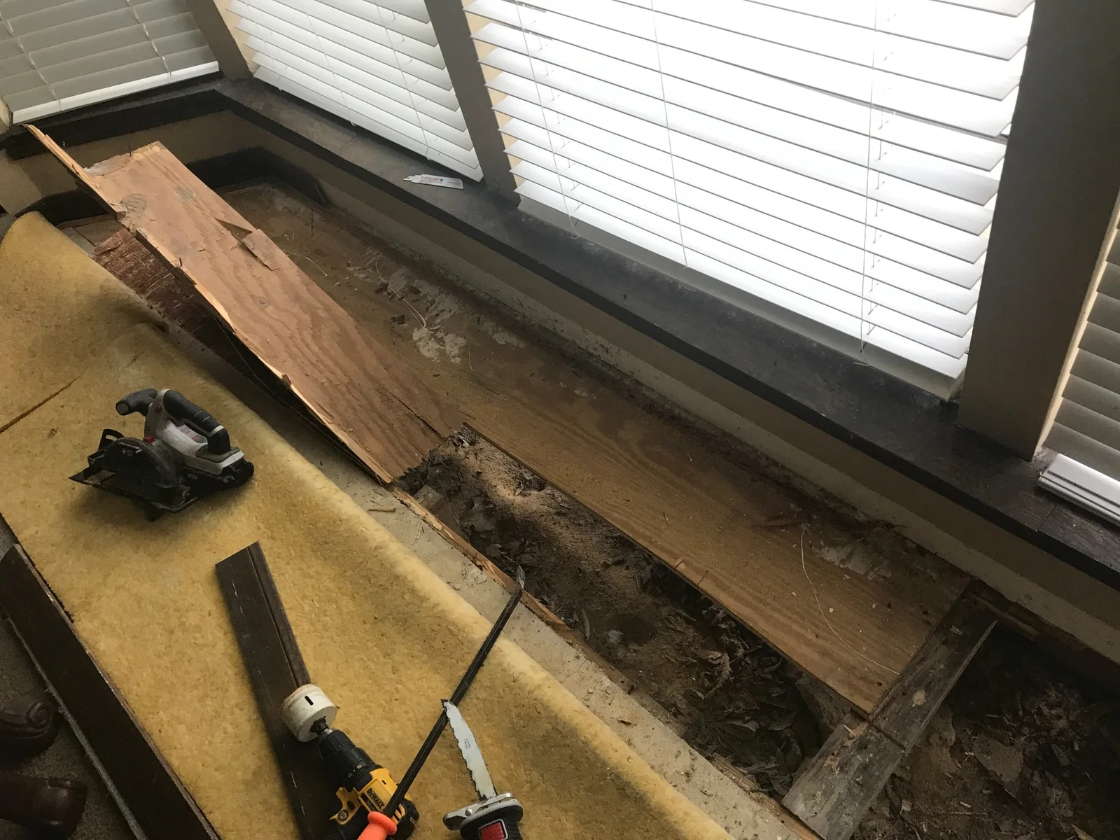 Damaged floor opened for repair